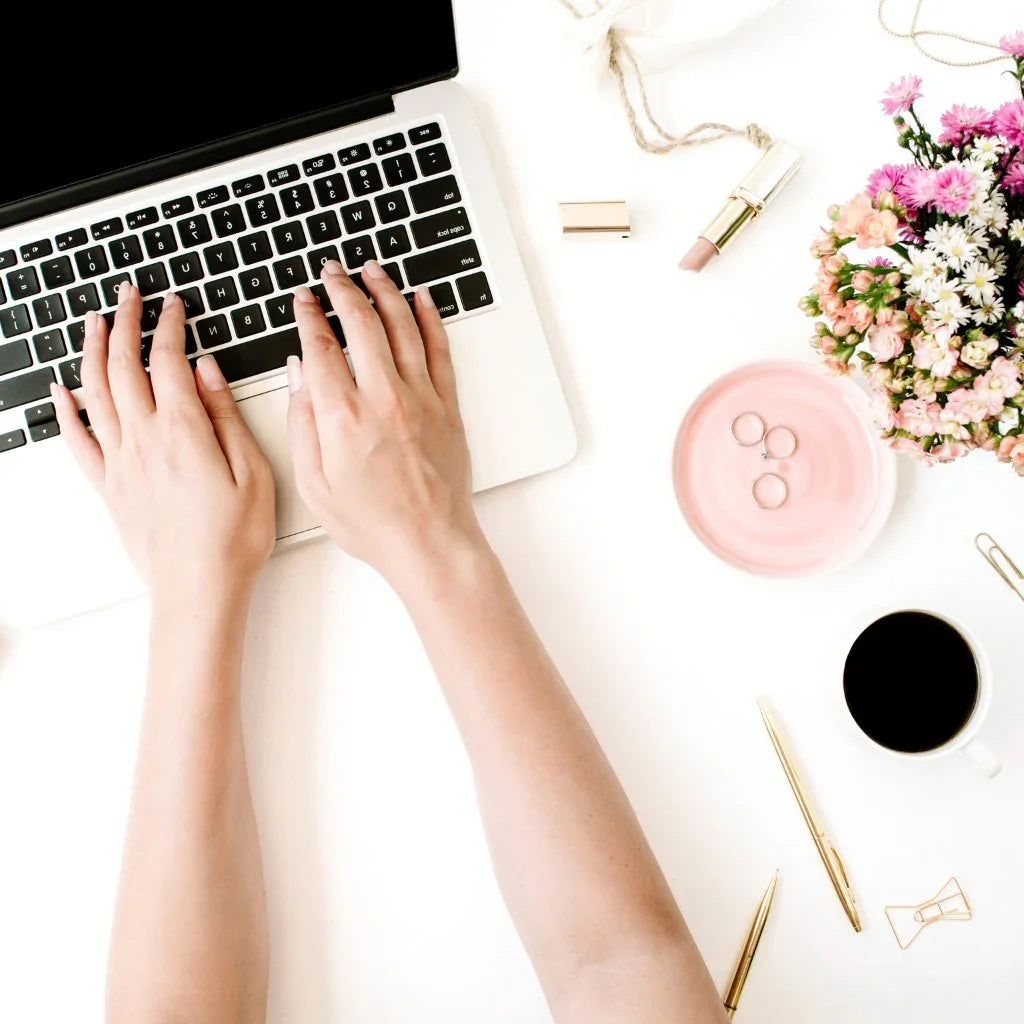 Womens Hands at Laptop