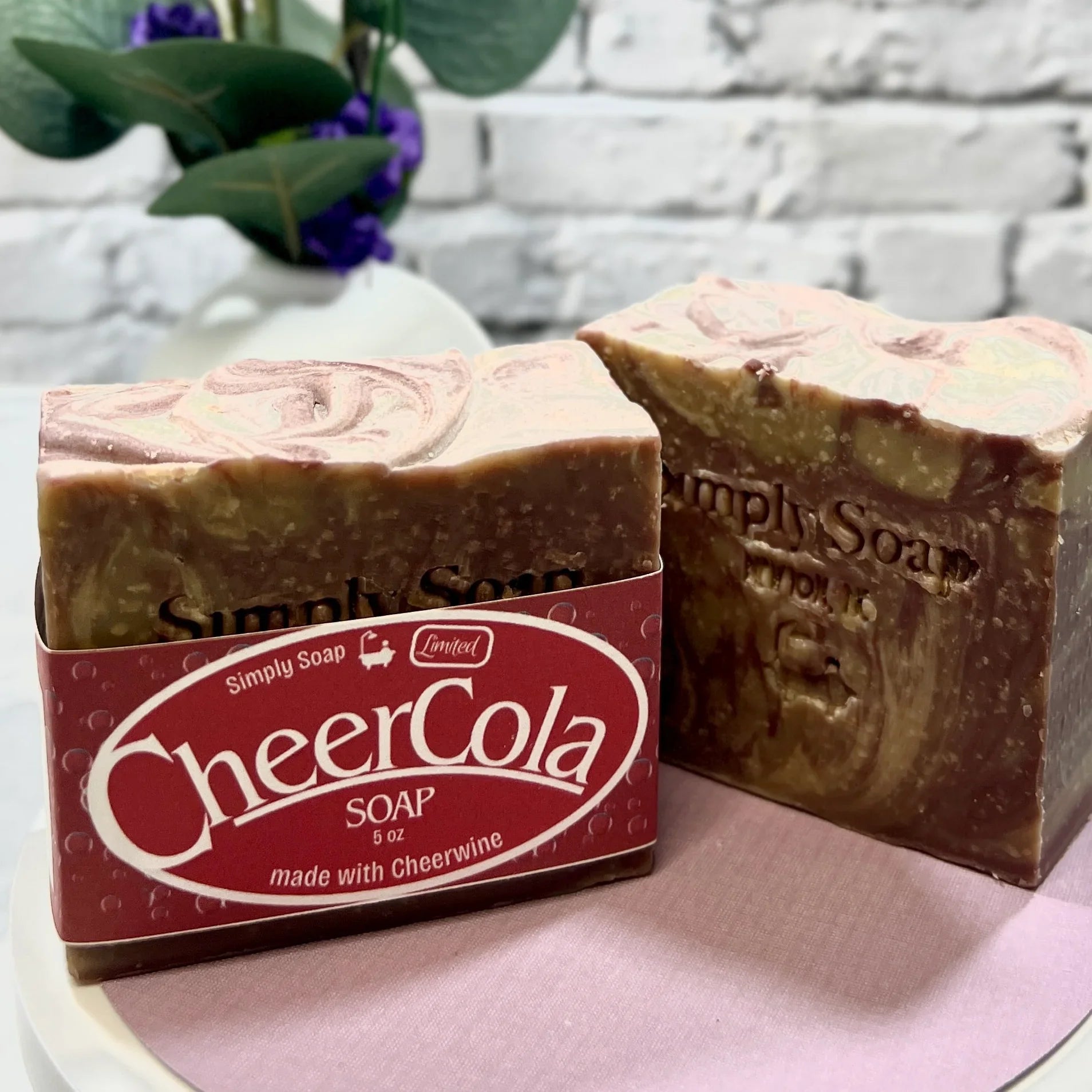 Cheer Cola soap 2 bars side by side on pink tabletop