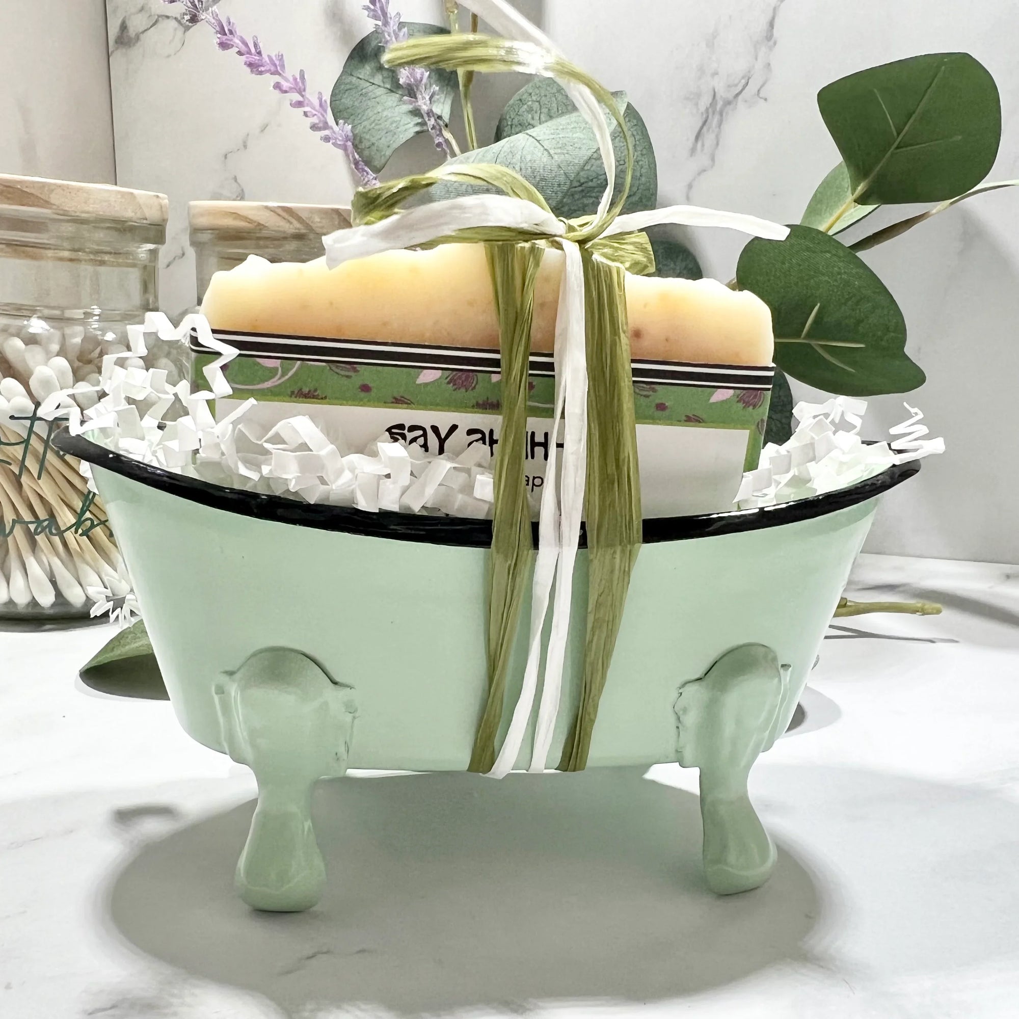 Soap in Bathtub green with soap from the front and wrapped with raffia