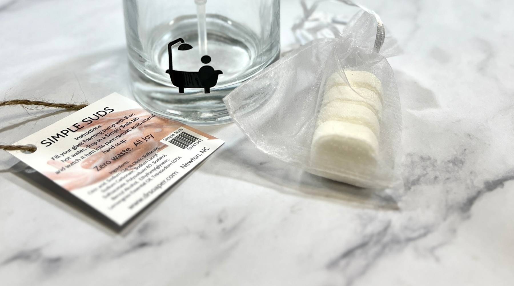 Simply Suds soap pump bottle and soap tablets.