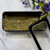 Black metal box with green hemp soap lift inside