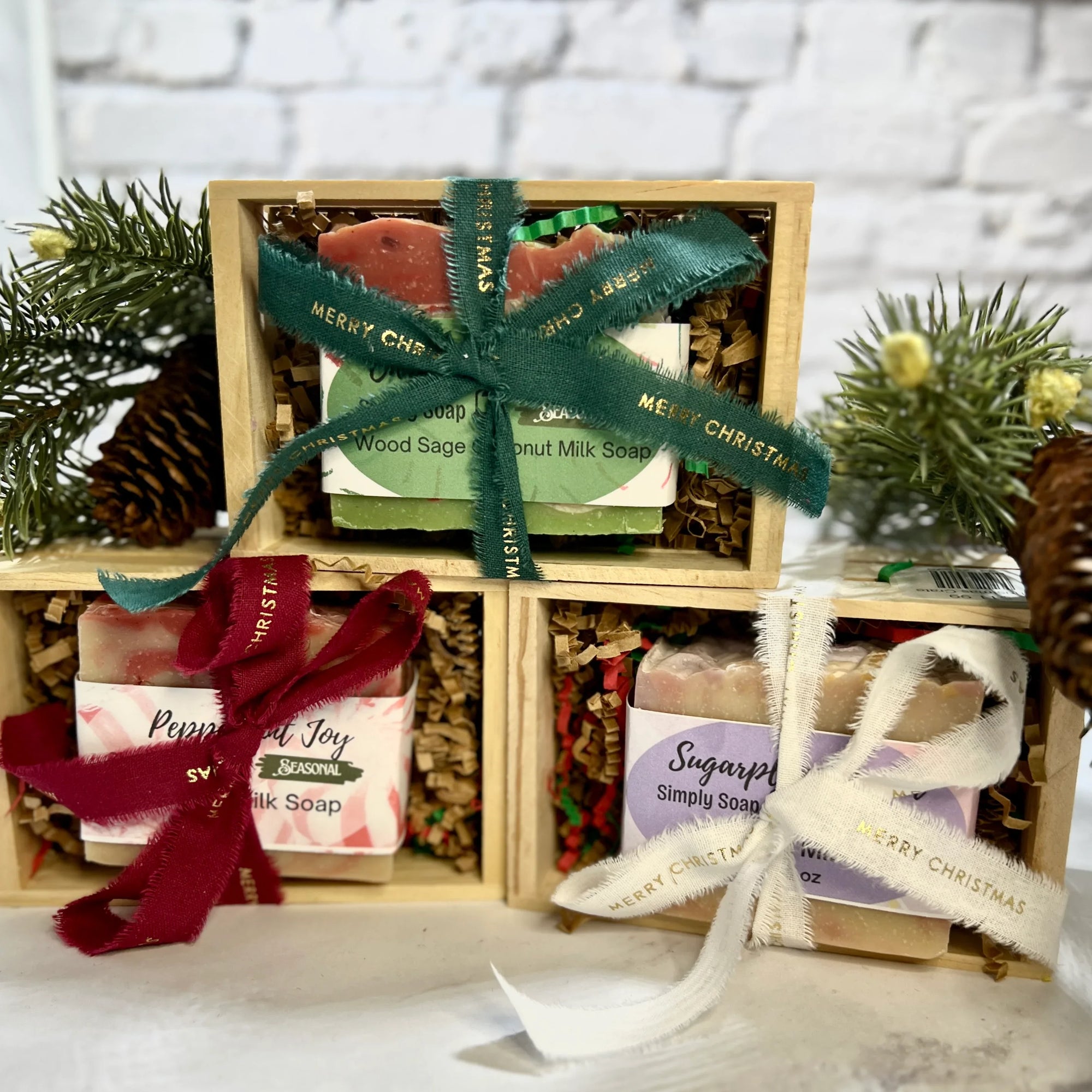 Christmas soap in wooden crate and wrapped with Merry Christmas ribbon