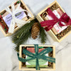 Christmas soap in wooden crate and wrapped with Merry Christmas ribbon in different colors