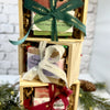 Christmas soap in wooden crate and wrapped with Merry Christmas ribbons in 3 colors. Stacked