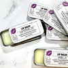 Dr. Soaper Natural Lip Balm tins, multiple with 2 tins open
