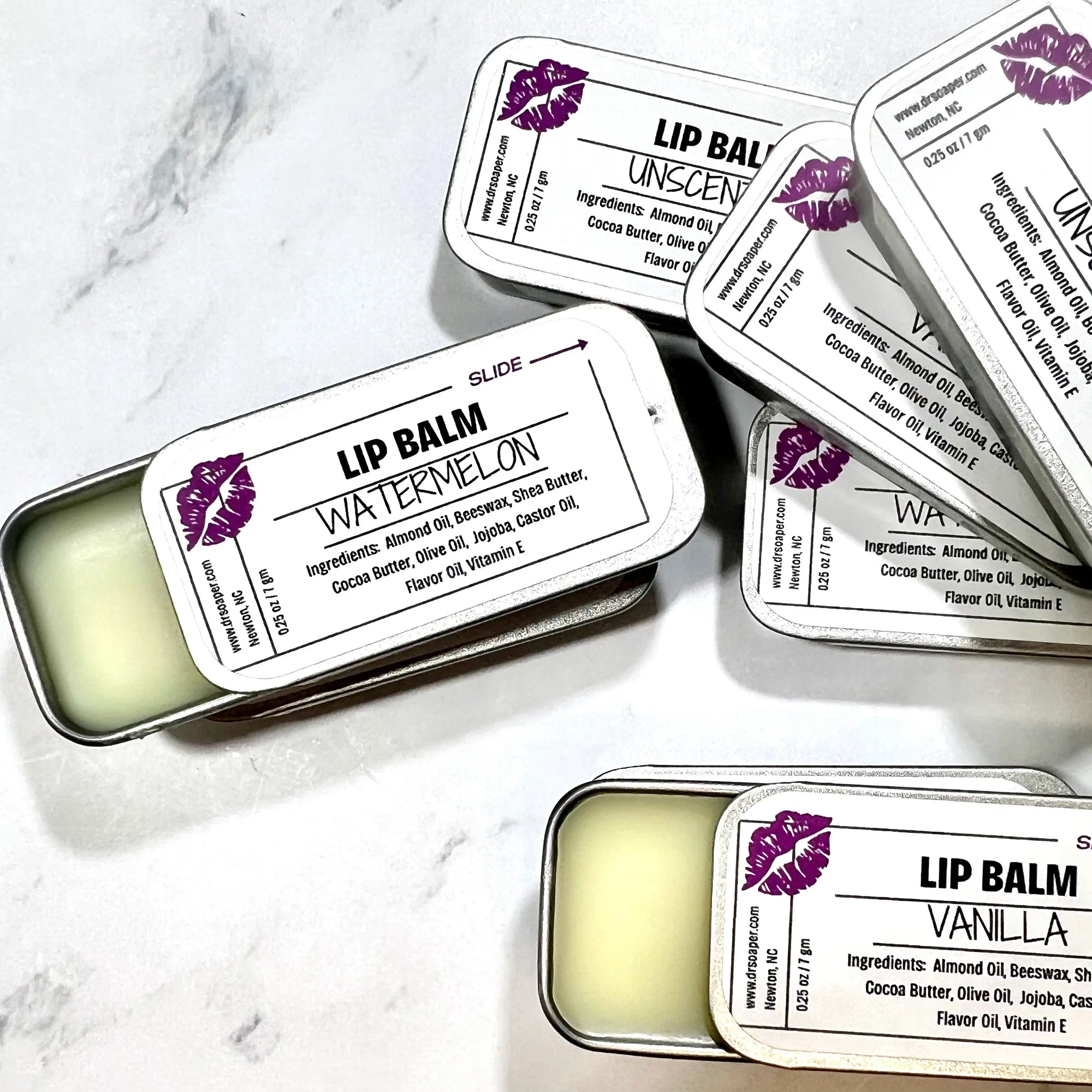 Dr. Soaper Natural Lip Balm tins, multiple with 2 tins open