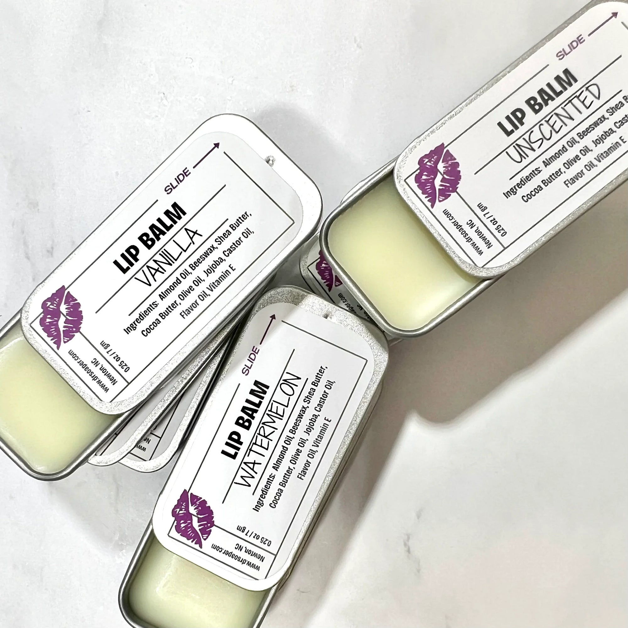 Dr. Soaper Natural Lip Balm tins, multiple with 3 tins open