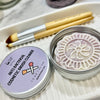 Dr Soaper's Cosmetic Brush Cleaner open with lid next to tin