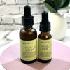 Two bottles of facial serum 
