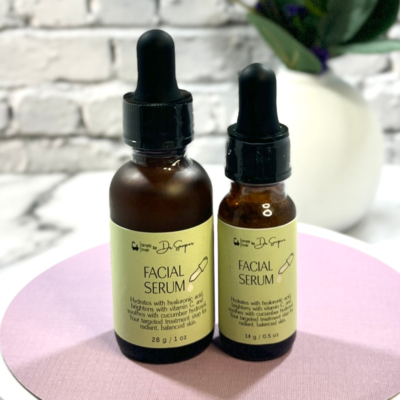 Two bottles of facial serum 