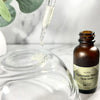 Hyaluronic Plus C Serum bottle and droplet