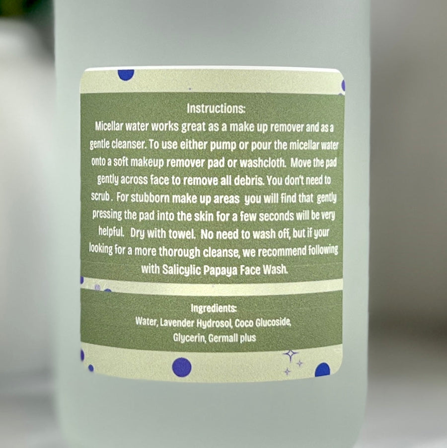 Bottle of micellar water with label detailing instructions and ingredients.