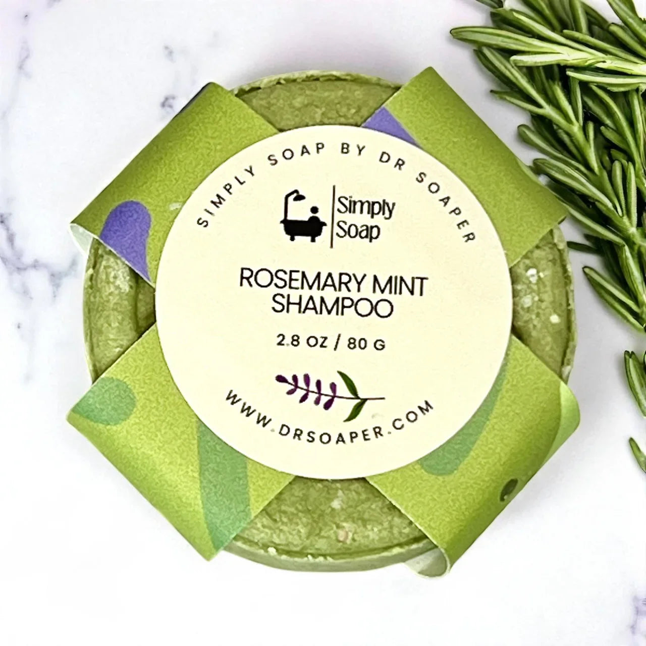 Rosemary, mint shampoo bar on marble surface