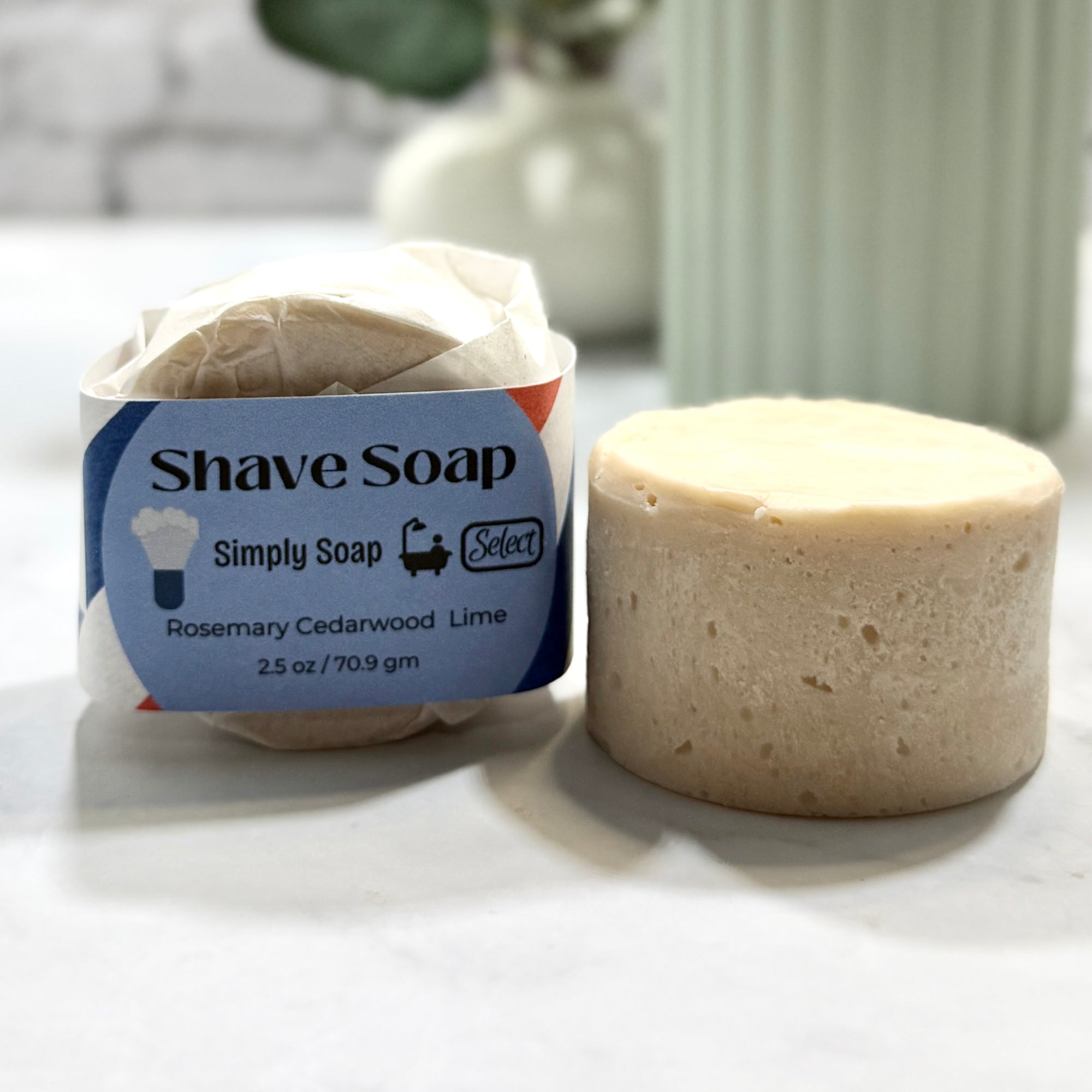 Shave soap with packaging on a white surface