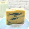 Single bar of Dr. Soaper Clean Sheets Coconut-Free Soap  with no label on a white surface