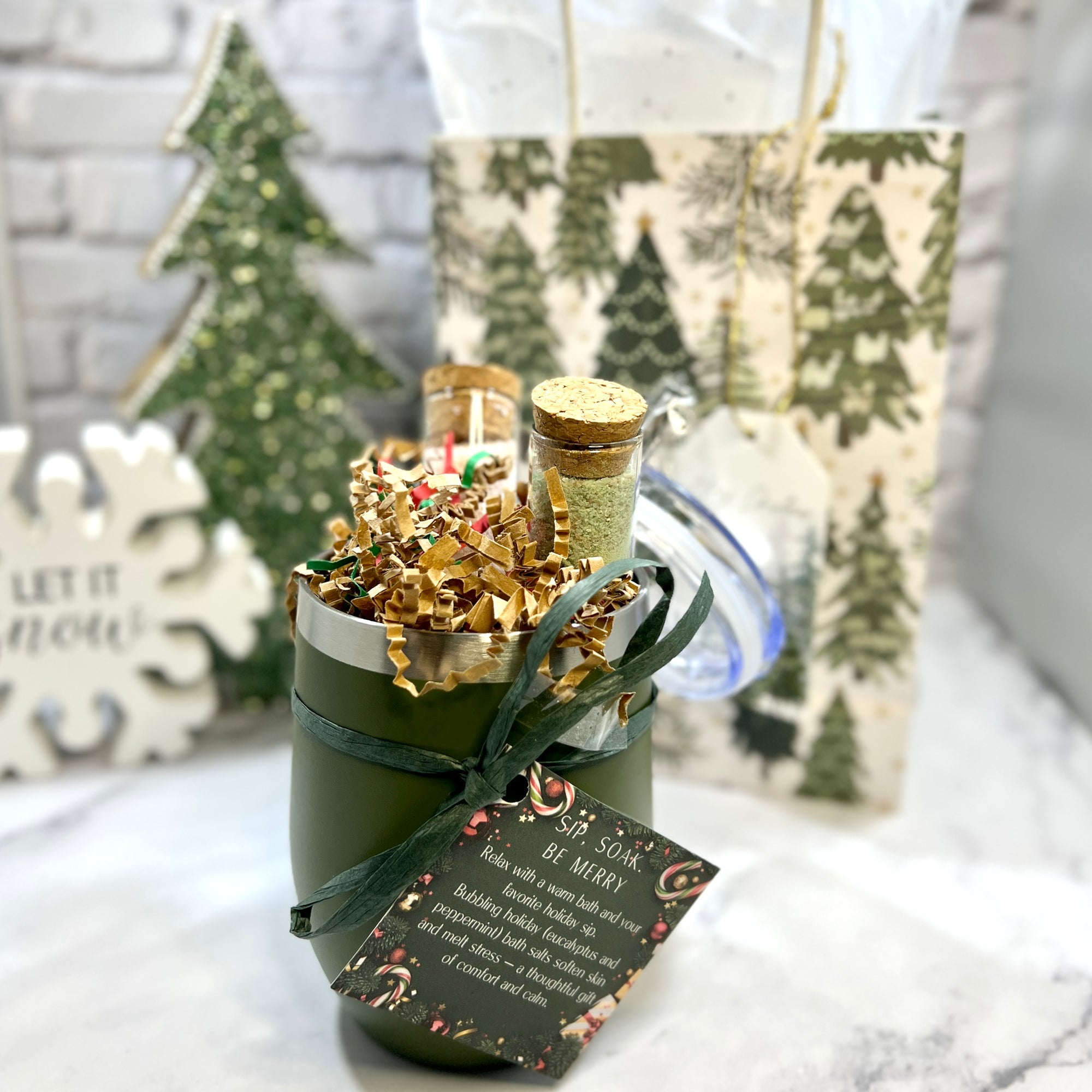 Stainless Steel wine tumbler  with bath salts, straw, brush, lid. Gift bag in background