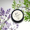 Tea tree and lavender shampoo bar with lavender flowers and leaves on a white background