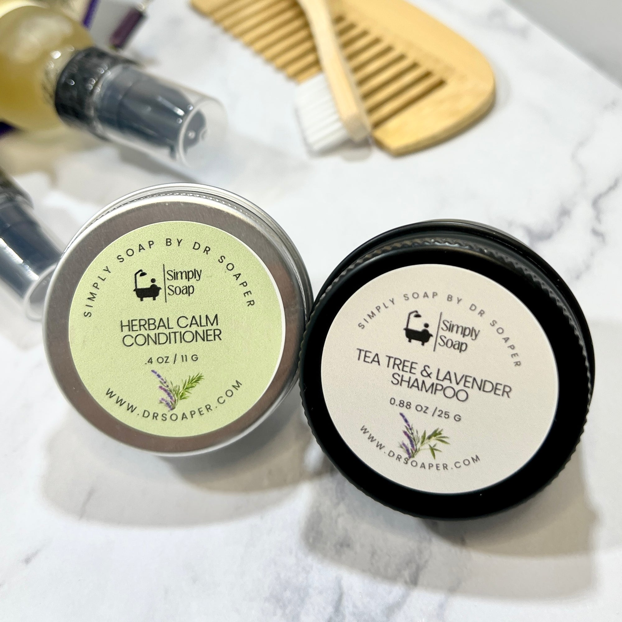 Travel Hair Conditioner and Shampoo Bars  in aluminum tins with white marble background