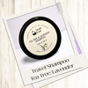 Travel-sized tea tree and lavender shampoo bar on a white background
