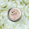 Tin of Simply Soap Bloom Essence Conditioner on a bed of white roses